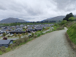 Descending trail with houses down below