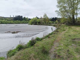 Single track running close by a river