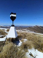 Mt Sale trig station with the ridge to Crown Peak in the background