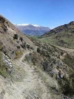 Single track leading down the side of a hill