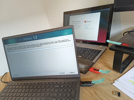 Two laptops racing to install a distro